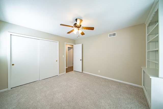 2310 Nottingham Dr, Columbus, GA 31904 - unfurnished bedroom with light carpet, a closet, and baseboards