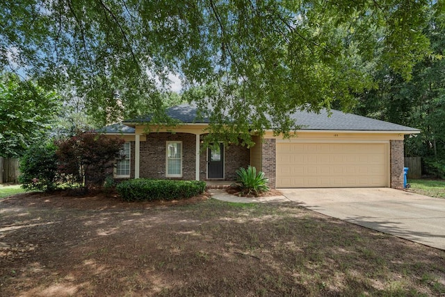 180 Plum Ct, Columbus, GA 31909 - ranch-style house featuring driveway, a garage, and brick siding