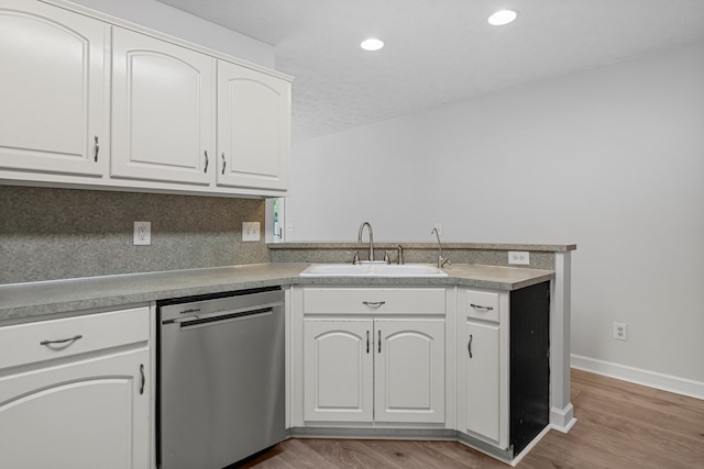 180 Plum Ct, Columbus, GA 31909 - kitchen featuring stainless steel dishwasher, white cabinets, light wood finished floors, and recessed lighting