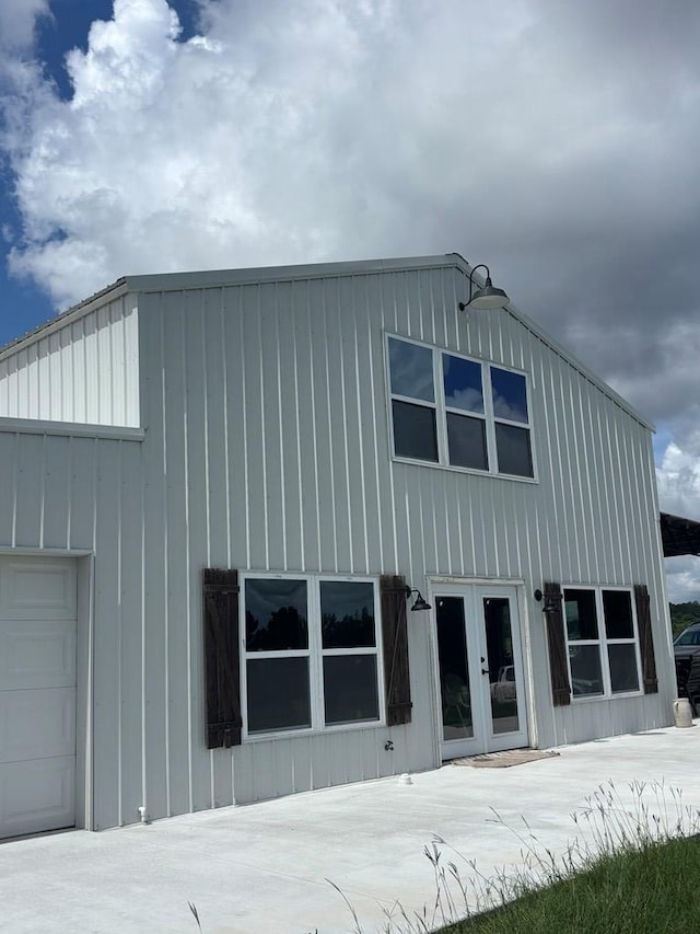 129 Hayes Rd, Mauk, GA 31058 - view of side of property featuring french doors and board and batten siding