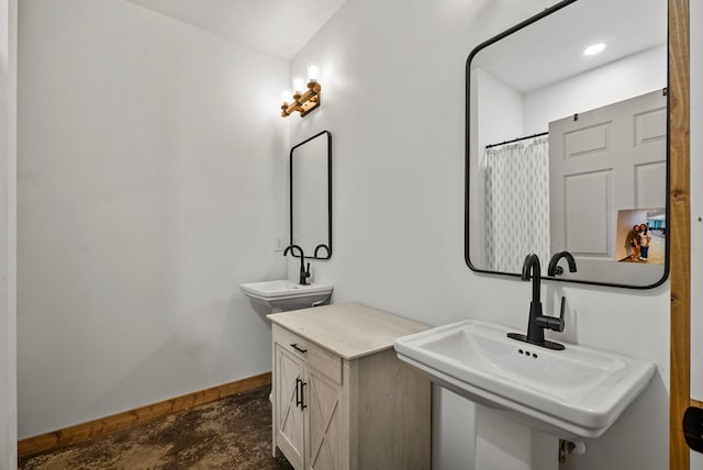 129 Hayes Rd, Mauk, GA 31058 - full bathroom with a sink and baseboards