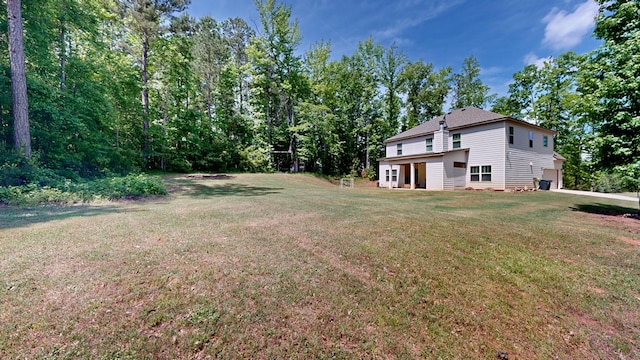 view of yard featuring an attached garage