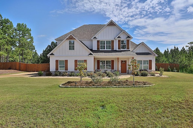 craftsman-style home with a front yard