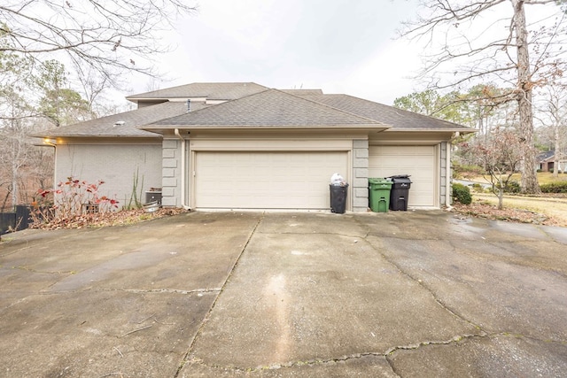 view of side of home with a garage