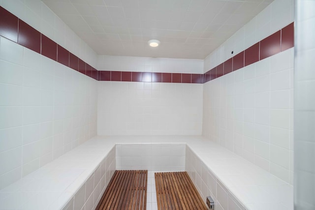 view of sauna featuring tile patterned floors