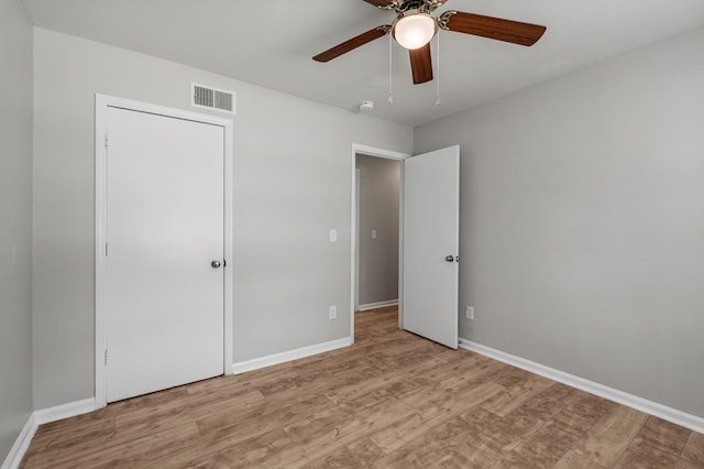 1918 Watkins Dr, Columbus, GA 31907 - unfurnished bedroom featuring light wood finished floors, baseboards, and ceiling fan