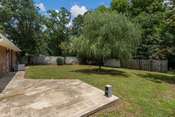 1918 Watkins Dr, Columbus, GA 31907 - view of yard featuring a patio and cooling unit