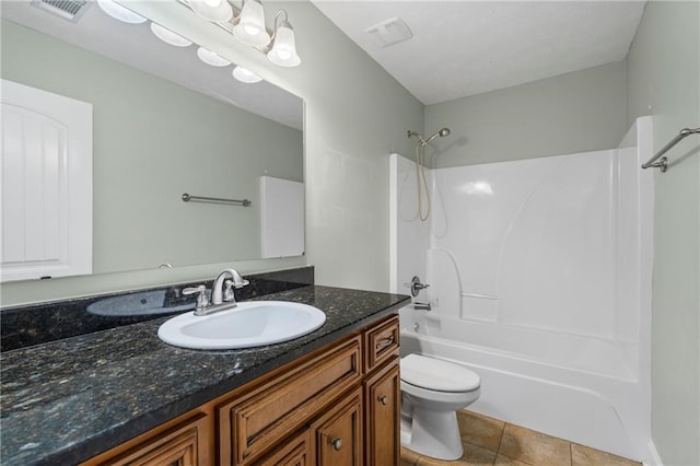 165 Wellman Dr, Phenix City, AL 36867 - full bath with  shower combination, toilet, visible vents, tile patterned flooring, and vanity