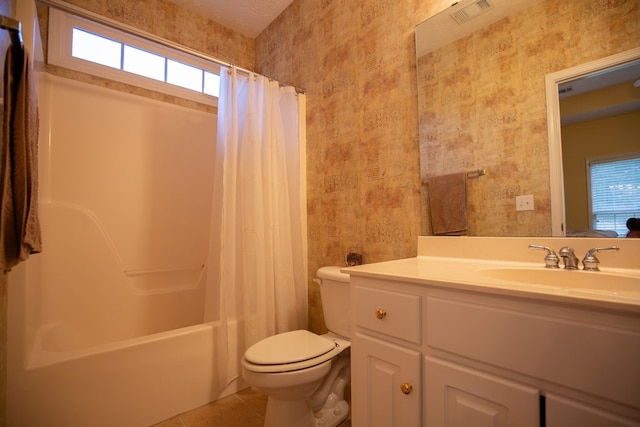 full bathroom featuring shower / tub combo, vanity, toilet, and tile patterned floors