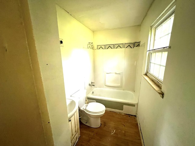 141 Patterson Rd, Fort Mitchell, AL 36856 - bathroom featuring wood finished floors, vanity, and washtub / shower combination