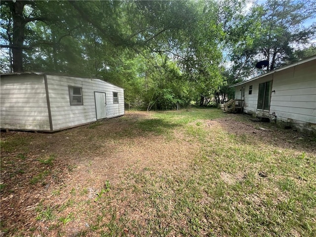 141 Patterson Rd, Fort Mitchell, AL 36856 - view of green lawn featuring an outdoor structure