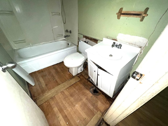 141 Patterson Rd, Fort Mitchell, AL 36856 - bathroom featuring wood finished floors, vanity, and washtub / shower combination