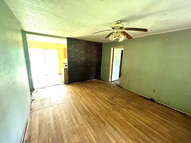 141 Patterson Rd, Fort Mitchell, AL 36856 - spare room featuring a ceiling fan, hardwood / wood-style floors, and a textured ceiling