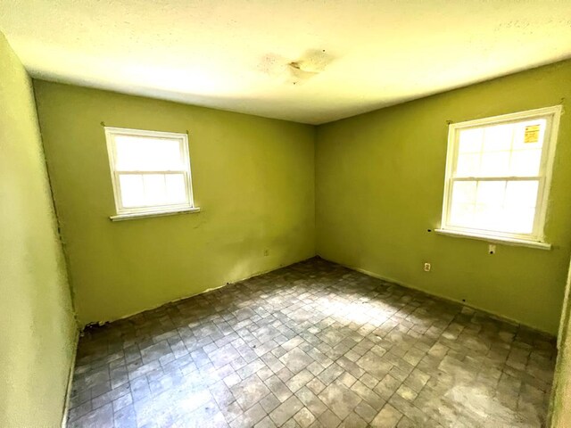 141 Patterson Rd, Fort Mitchell, AL 36856 - unfurnished room featuring brick patterned flooring