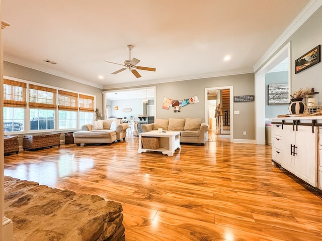4880 Turnberry Ln, Columbus, GA 31909 - living room featuring ornamental molding, a ceiling fan, light wood finished floors, and recessed lighting