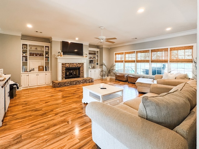 4880 Turnberry Ln, Columbus, GA 31909 - living room featuring ornamental molding, ceiling fan, light wood-type flooring, a fireplace, and recessed lighting