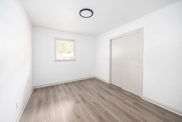 2104 Wellborn Dr, Columbus, GA 31907 - unfurnished bedroom featuring light wood-type flooring and a closet
