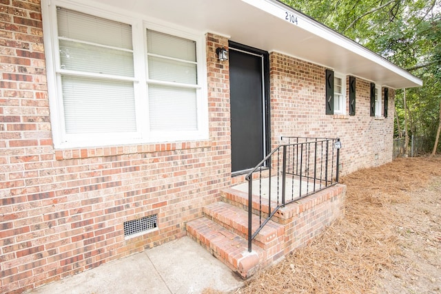 2104 Wellborn Dr, Columbus, GA 31907 - view of exterior entry with brick siding and crawl space