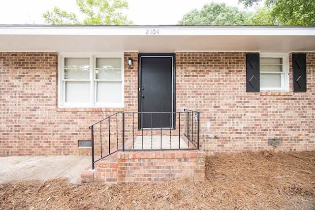 2104 Wellborn Dr, Columbus, GA 31907 - doorway to property featuring crawl space and brick siding