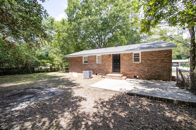 2104 Wellborn Dr, Columbus, GA 31907 - rear view of property featuring crawl space, brick siding, and a patio area