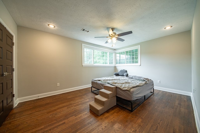2027 Preston Dr, Columbus, GA 31906 - bedroom with dark wood-type flooring, baseboards, a textured ceiling, ceiling fan, and recessed lighting