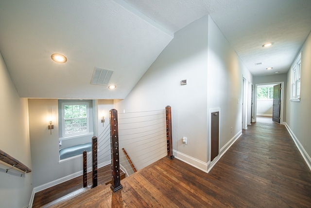 2027 Preston Dr, Columbus, GA 31906 - stairs featuring wood finished floors, baseboards, recessed lighting, vaulted ceiling, and a textured ceiling