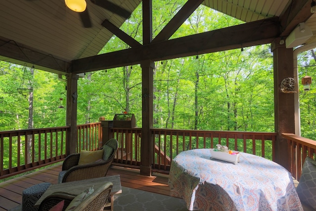 deck featuring a forest view