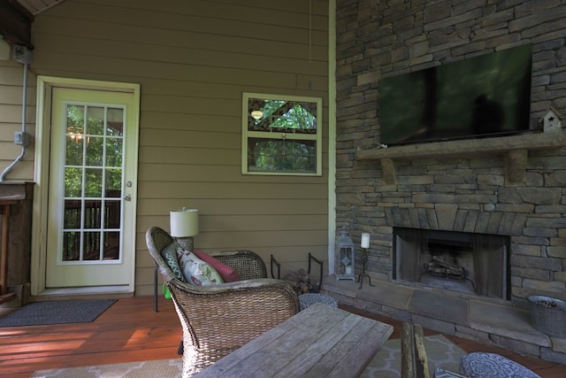 exterior space featuring an outdoor stone fireplace