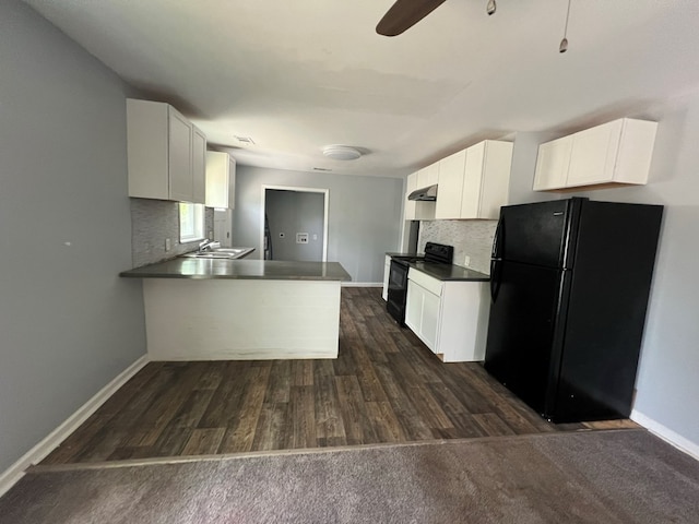 4261 Meritas Dr, Columbus, GA 31904 - kitchen featuring dark countertops, baseboards, backsplash, and black appliances