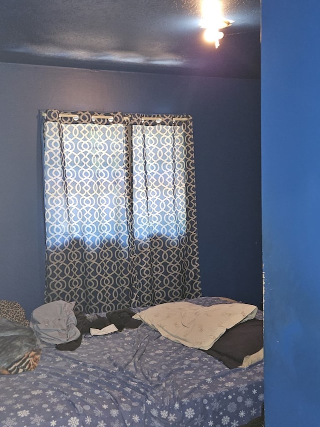 bedroom with a textured ceiling