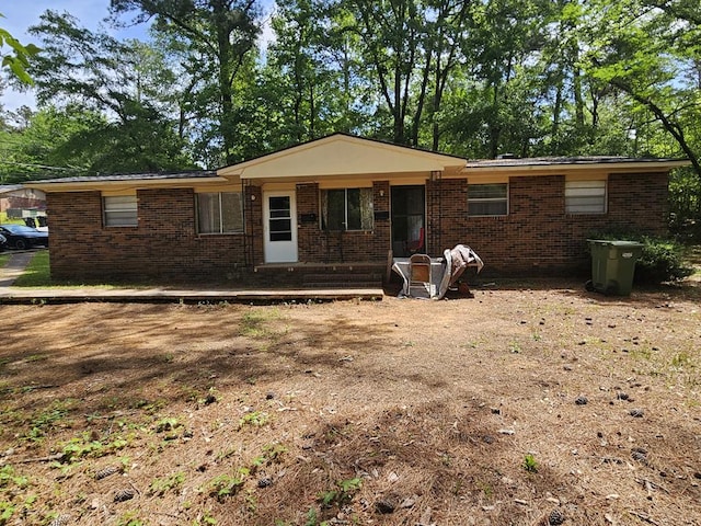 exterior space with brick siding