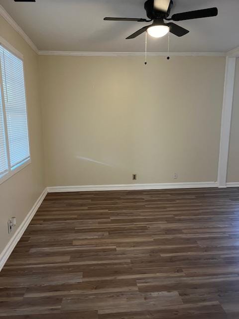 unfurnished room featuring ceiling fan, crown molding, and dark wood-type flooring