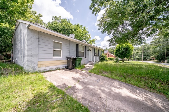 1605 39th St, Columbus, GA 31904 - single story home with brick siding and a chimney