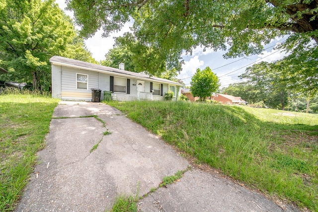 1605 39th St, Columbus, GA 31904 - ranch-style house featuring a chimney and brick siding