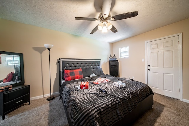 1605 39th St, Columbus, GA 31904 - carpeted bedroom with a textured ceiling and ceiling fan