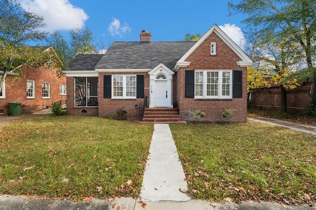 view of front of home with a front lawn