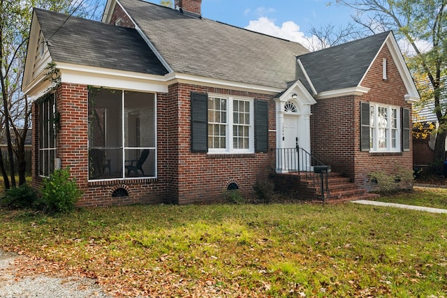 view of front of home with a front lawn