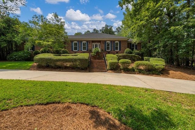 1425 Dartmouth Rd, Columbus, GA 31904 - ranch-style home with a front yard and brick siding