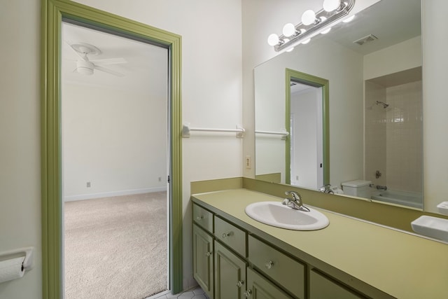 1425 Dartmouth Rd, Columbus, GA 31904 - bathroom with vanity, toilet, and bathtub / shower combination