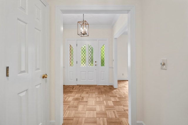 1425 Dartmouth Rd, Columbus, GA 31904 - entrance foyer with a chandelier, ornamental molding, and baseboards