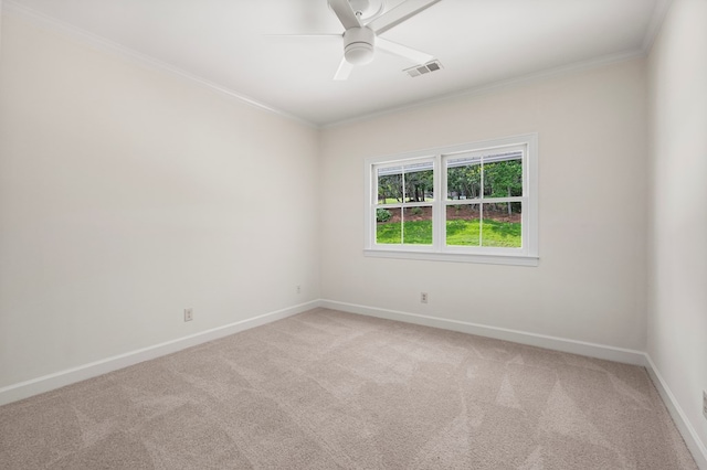 1425 Dartmouth Rd, Columbus, GA 31904 - spare room featuring ornamental molding, light colored carpet, baseboards, and ceiling fan