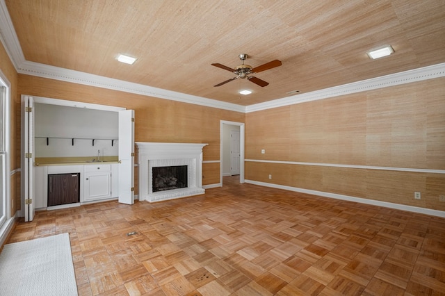 1425 Dartmouth Rd, Columbus, GA 31904 - unfurnished living room featuring baseboards, a ceiling fan, a brick fireplace, crown molding, and wood ceiling