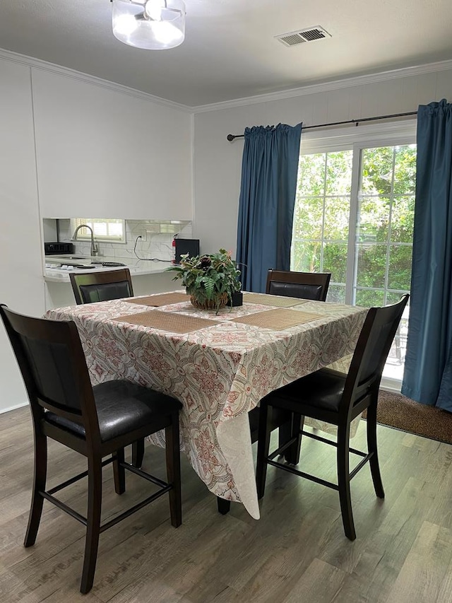 1023 Maridele Dr, Columbus, GA 31904 - dining room featuring crown molding and wood finished floors