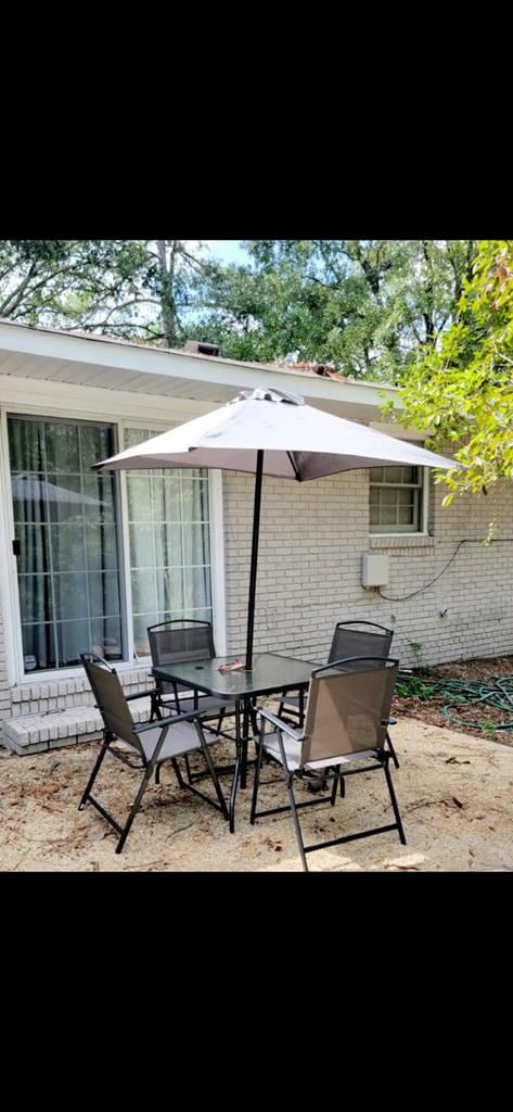 1023 Maridele Dr, Columbus, GA 31904 - view of patio / terrace featuring a sunroom