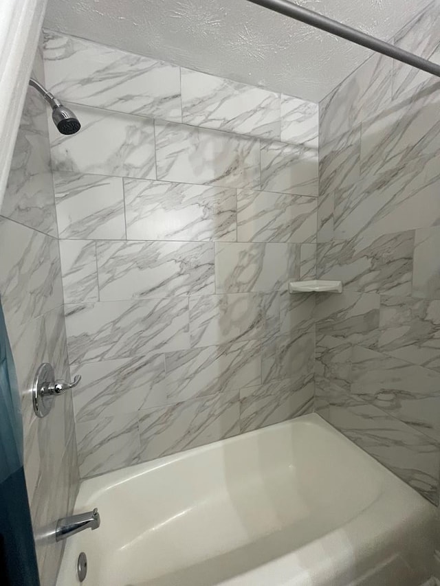 1023 Maridele Dr, Columbus, GA 31904 - bathroom with shower / bath combination and a textured ceiling