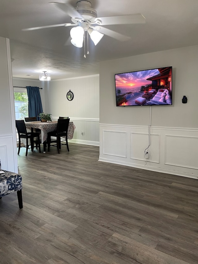 1023 Maridele Dr, Columbus, GA 31904 - living area with a decorative wall, a ceiling fan, and dark wood-style flooring