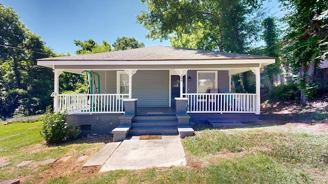 205 19th St, Phenix City, AL 36867 - bungalow-style home with a porch and a front lawn