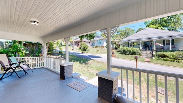 205 19th St, Phenix City, AL 36867 - wooden porch with a yard