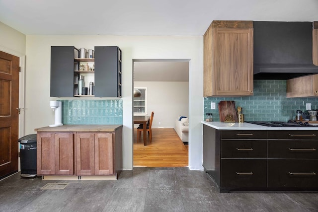 2618 Habersham Ave, Columbus, GA 31906 - kitchen with dark wood finished floors, range hood, light countertops, open shelves, and backsplash
