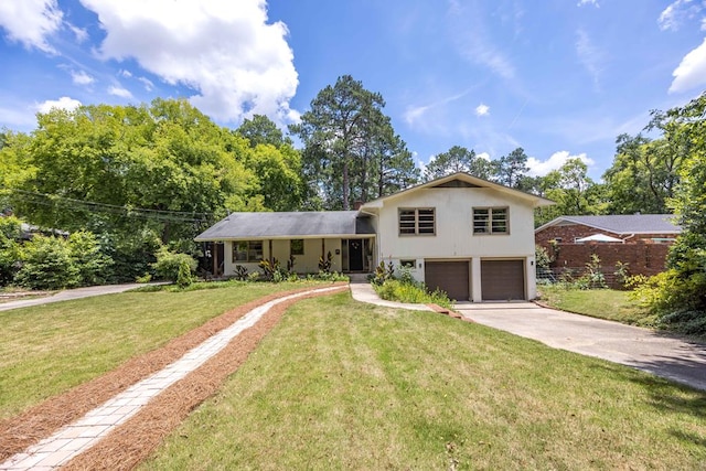 2618 Habersham Ave, Columbus, GA 31906 - tri-level home with a garage, concrete driveway, and a front lawn